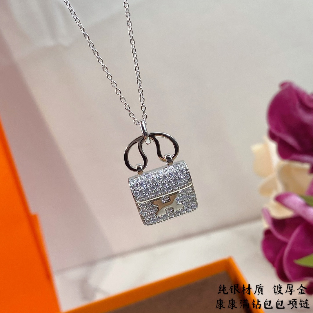 hermès fully Di*m*nd-encrusted h bag necklace
