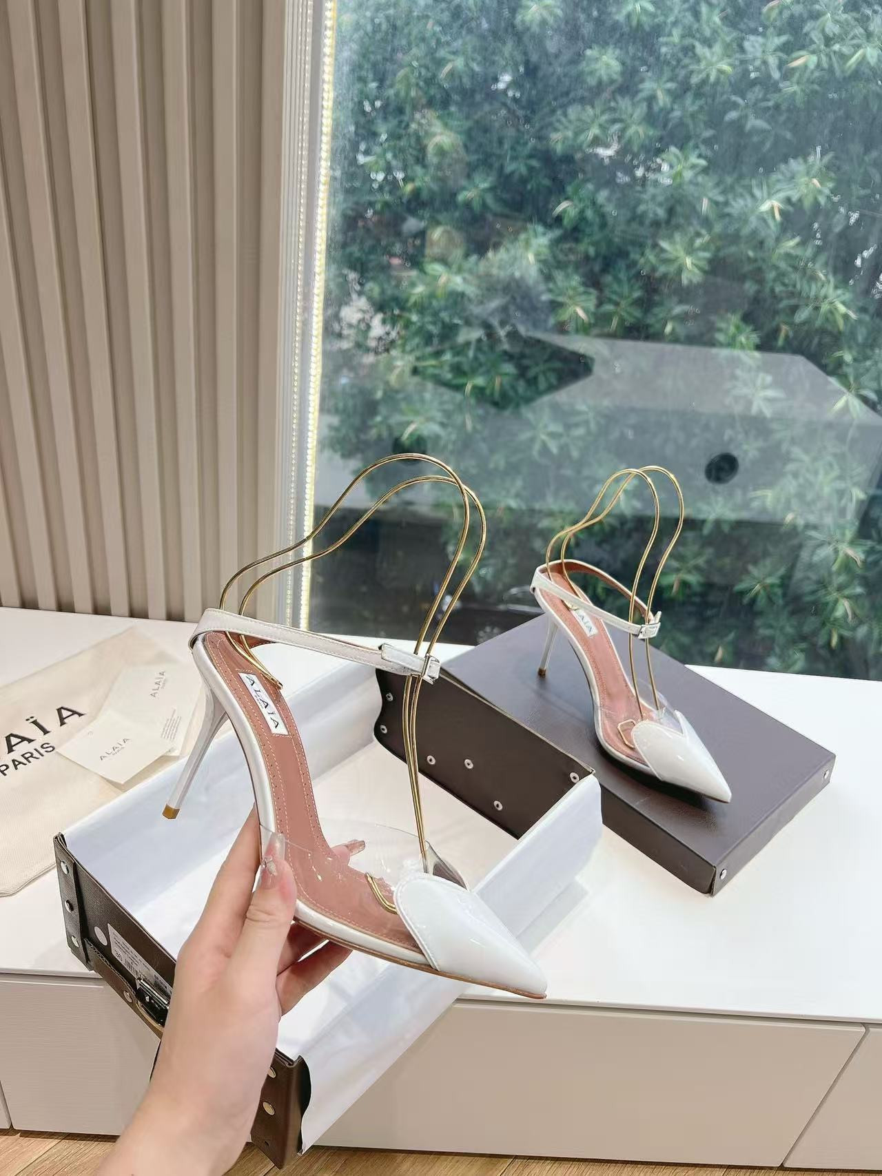 UA ALAÏA Patent Heart-Toe Stiletto Pumps