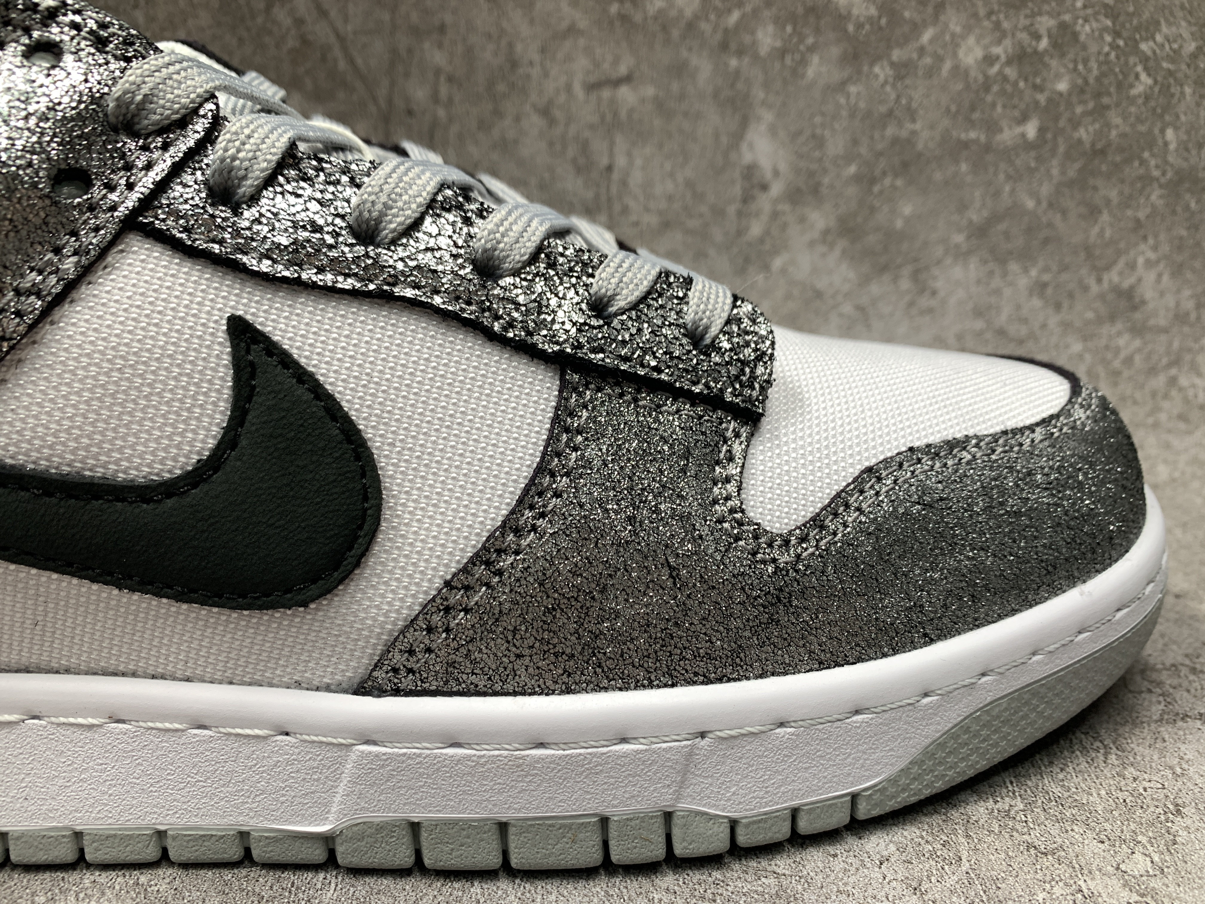 Nike Dunk Low Features Silver Cracked Leather