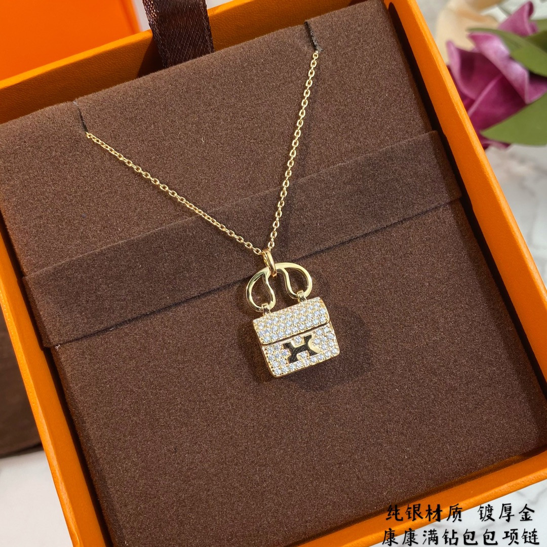 hermès fully Di*m*nd-encrusted h bag necklace