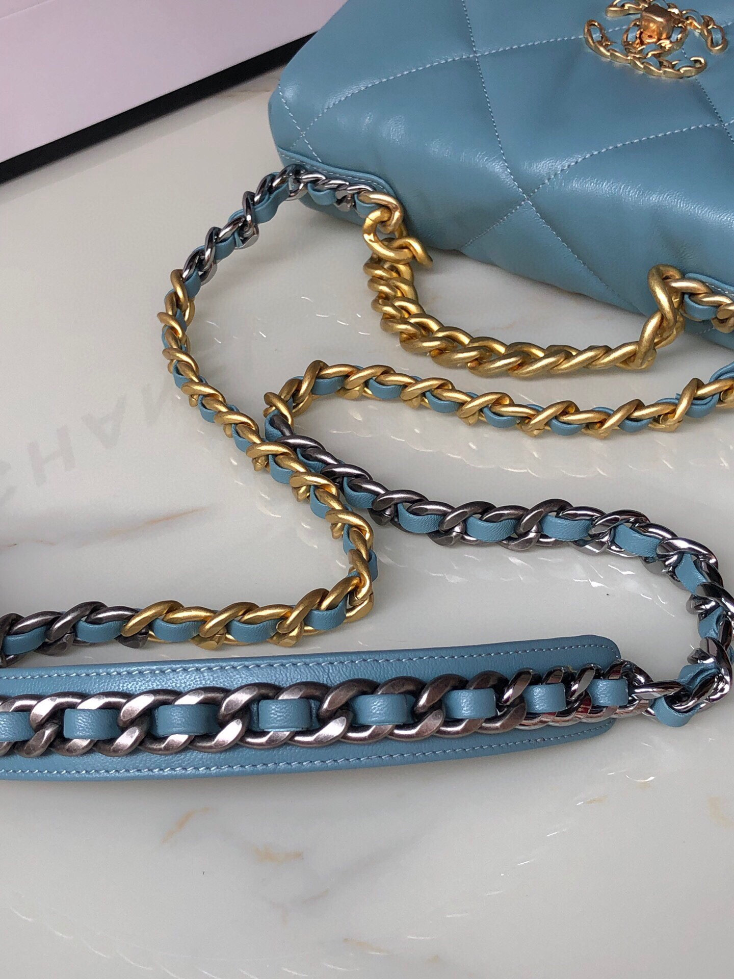 Ch*el 19 handbag shiny leather, gold-tone, silver-tone & ruthenium-finish metal blue 6.2 × 10.1 × 3.5 in