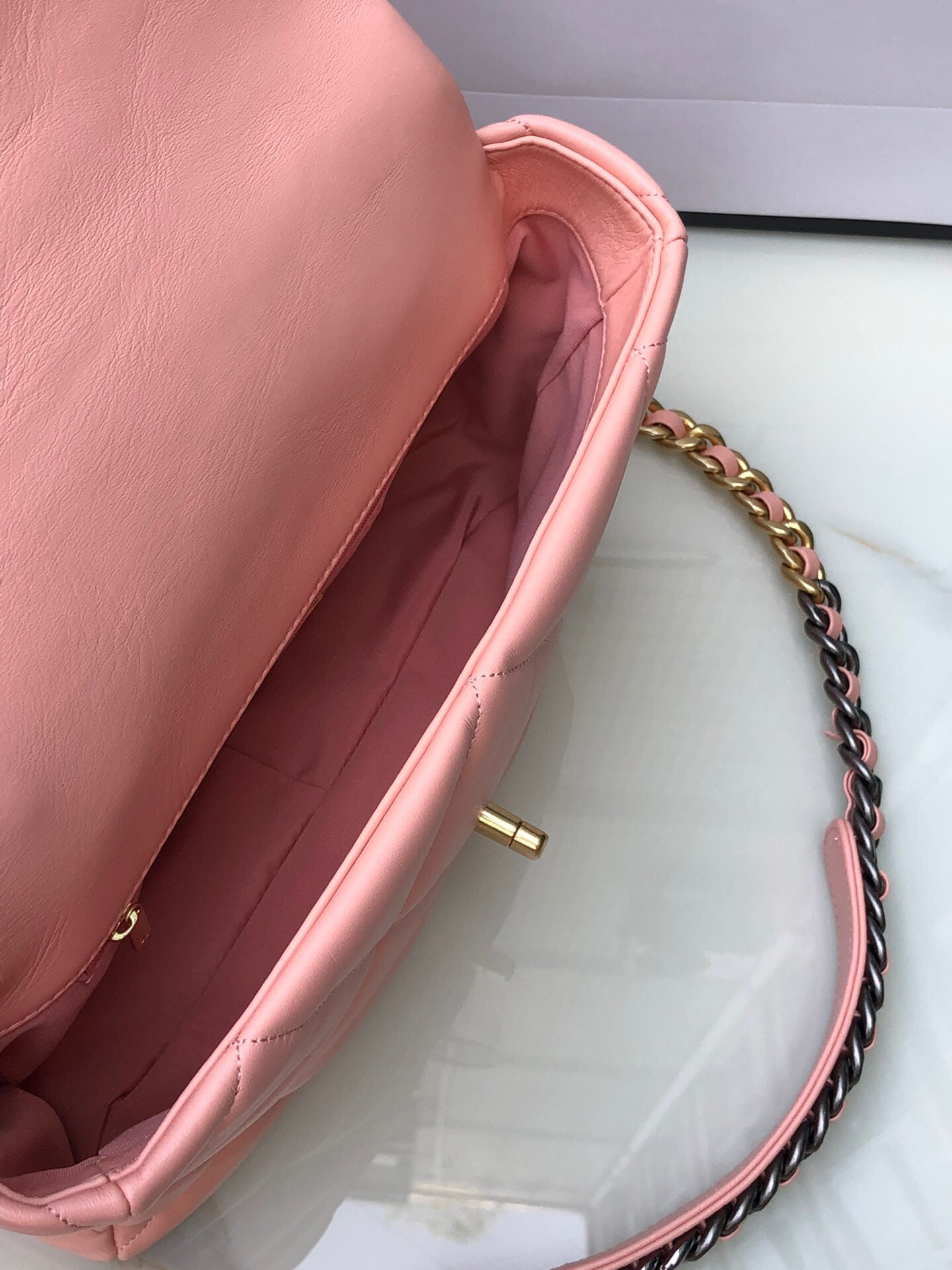 Ch*el 19 large handbag shiny leather, gold-tone, silver-tone & ruthenium-finish metal light pink 7.8 × 11.7 × 3.9 in