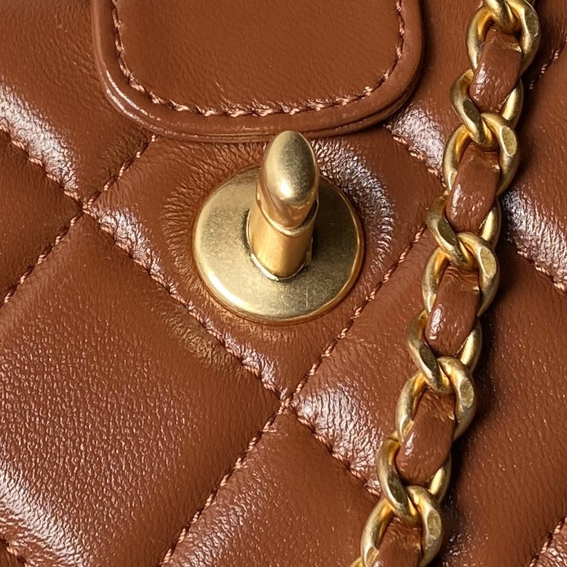 Ch*el mini bag with top handle shiny lambskin & gold-tone metal brown 12 × 18 × 7 cm